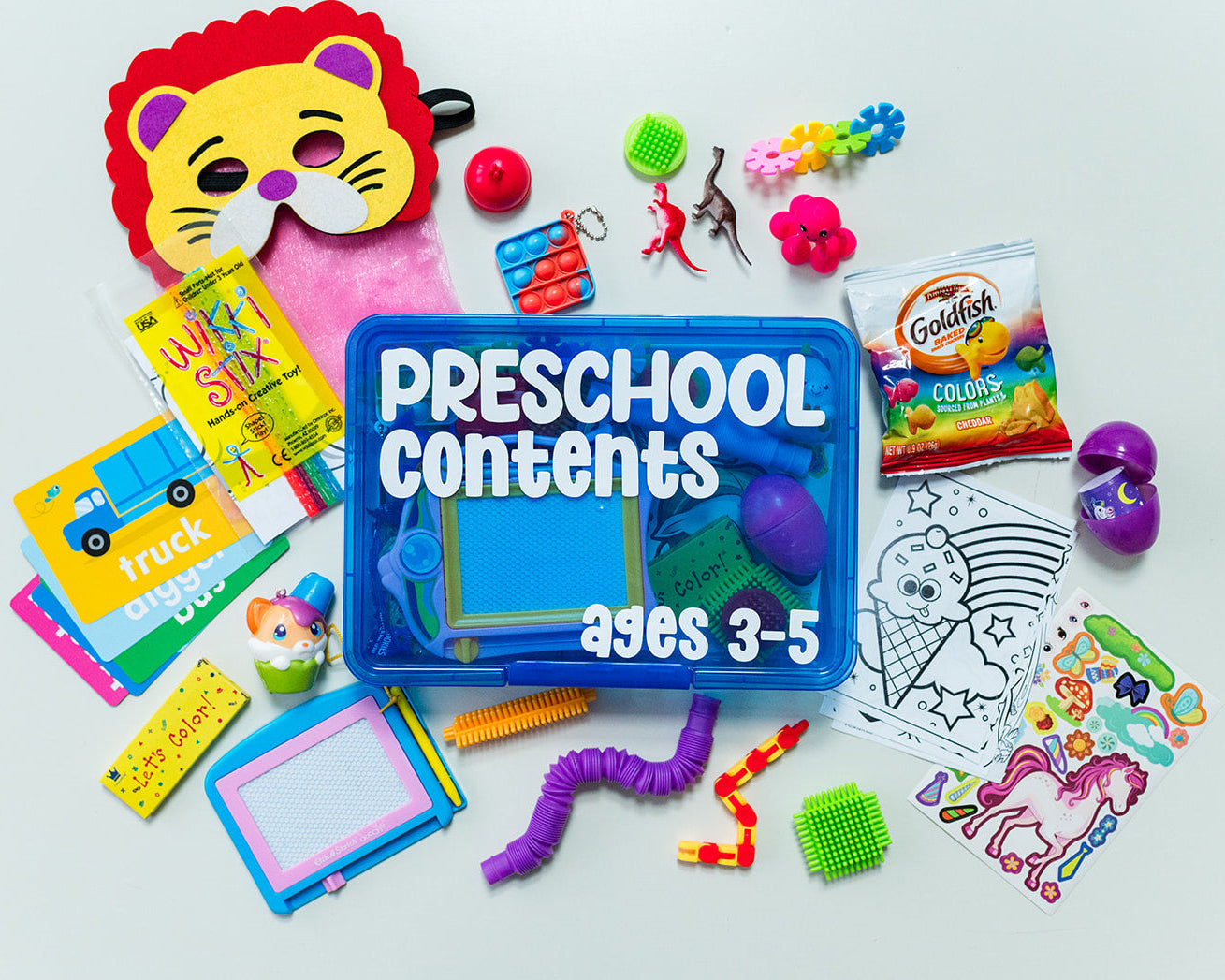 Assorted preschool toys and activities on a white background with a blue box labeled 'Preschool Contents Ages 3-5'.