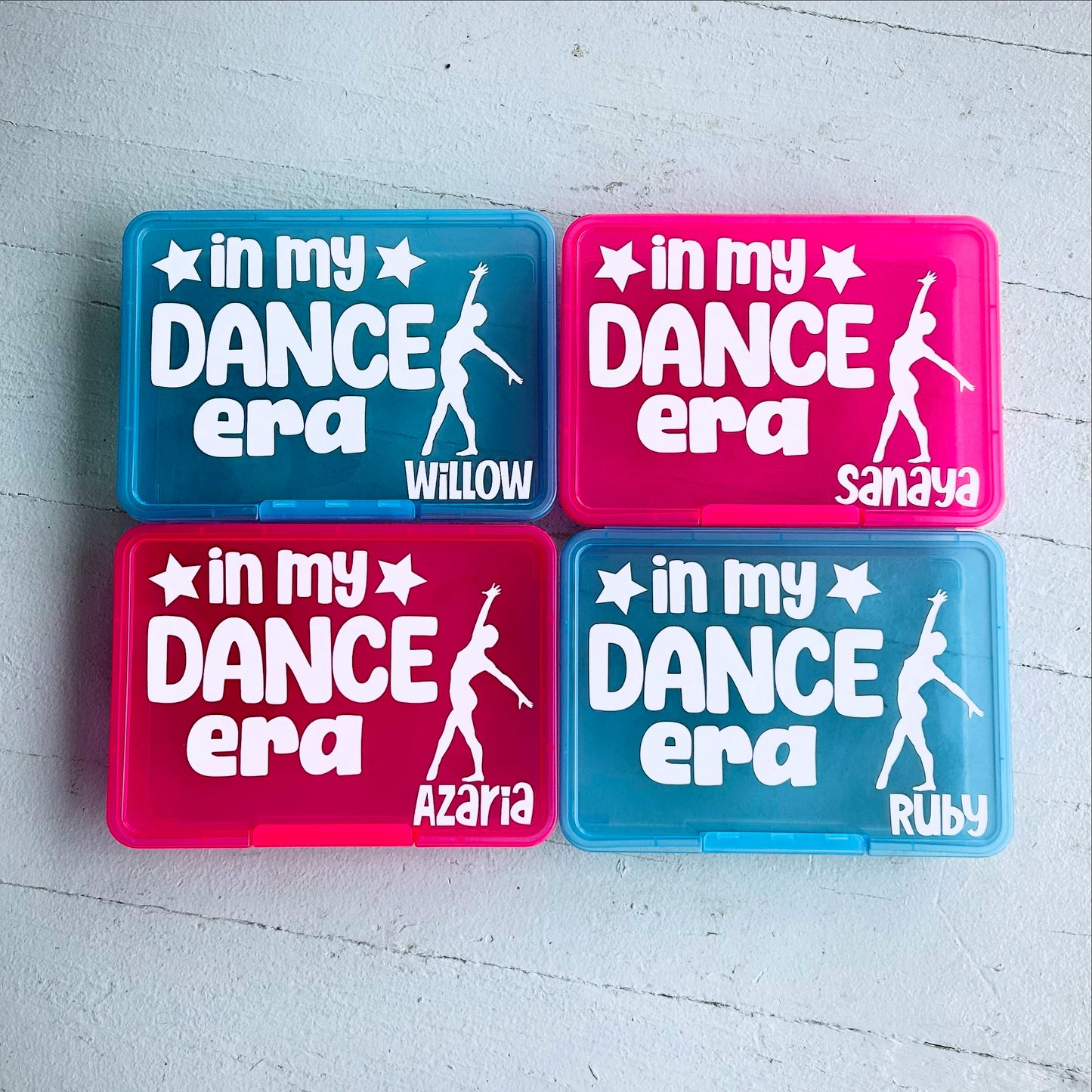 Four 'in my DANCE era' containers with different names on a light gray background