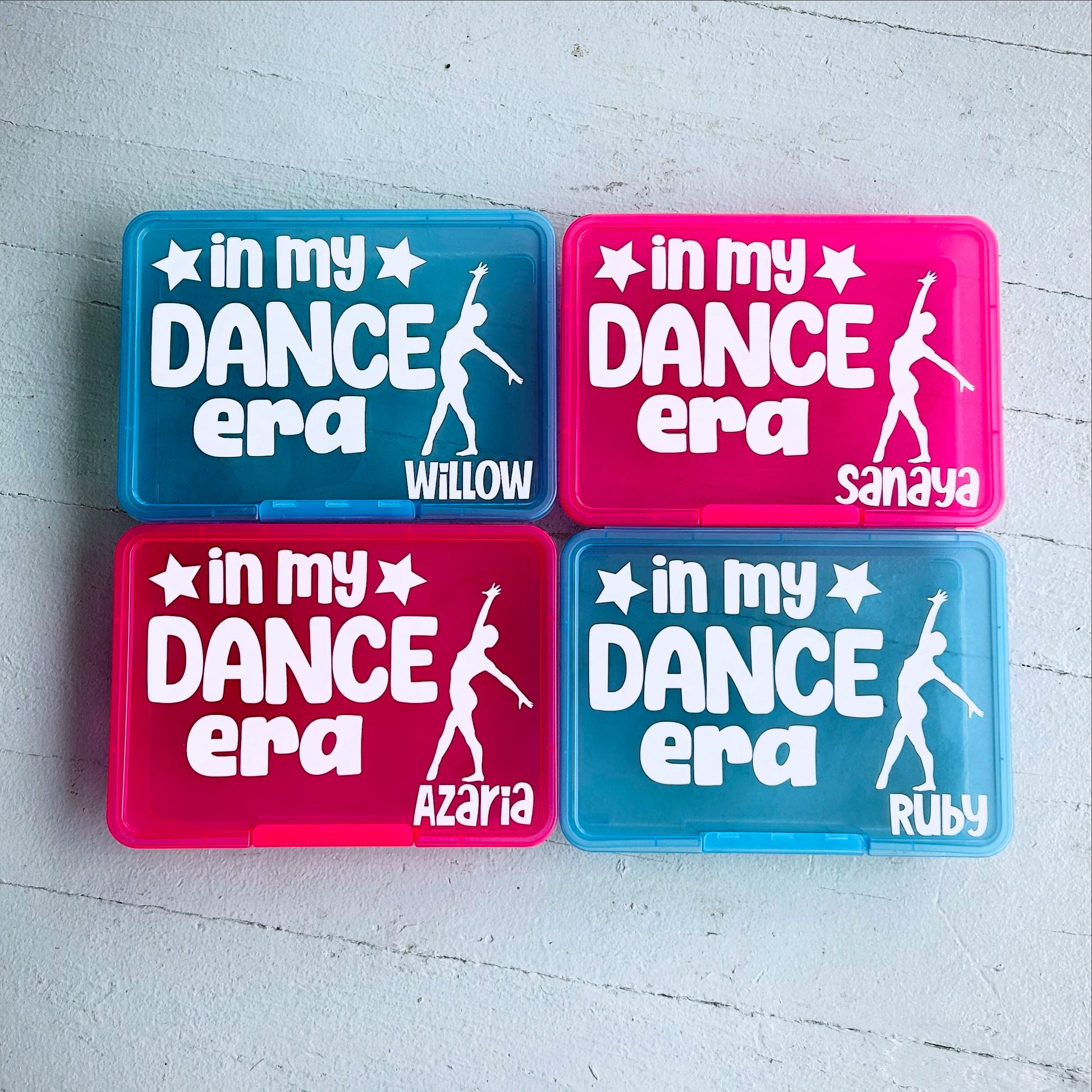 Four 'in my DANCE era' containers with different names on a light gray background