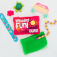 Colorful fidget toys and a 'Wedding Fun Quinn' box on a white background