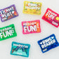 Colorful wedding-themed pins on a white background