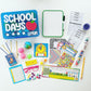A blue plastic storage box with the words 'School Days' and a red apple. The box has three stars and the name 'Logan' written on it. The box is surrounded by various school supplies including a white board, a clock, a globe, a pencil, a ruler, a number chart, a set of alphabet tiles, a set of stickers, a set of report cards, a set of attendance sheets, a set of building blocks, a set of crayons, a set of glasses, a set of puzzle pieces, and a set of star stickers.